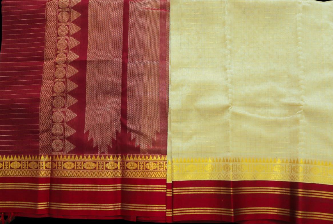 Halfwhite with meroon saree