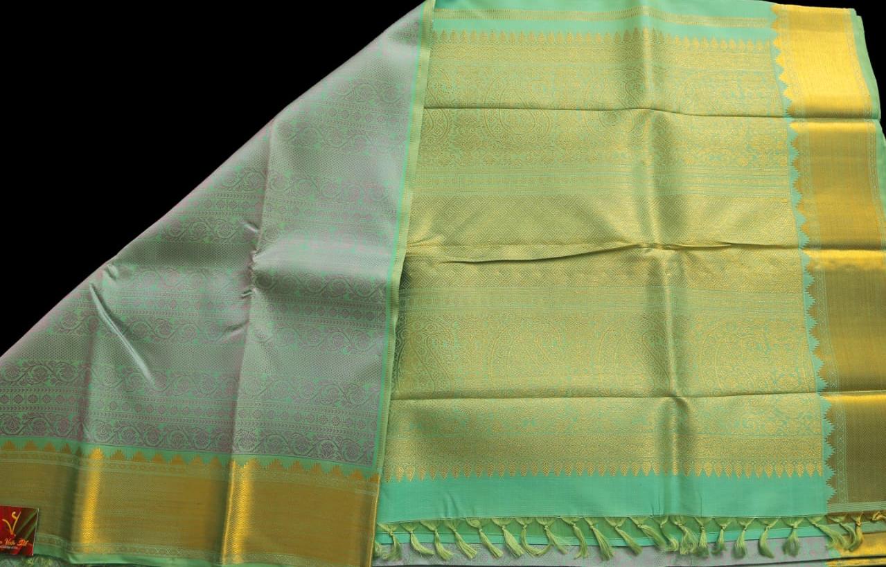 Teal green with lavender saree