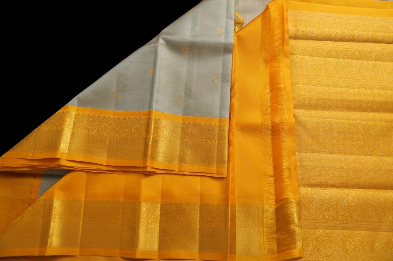 Grey and mustard yellow saree