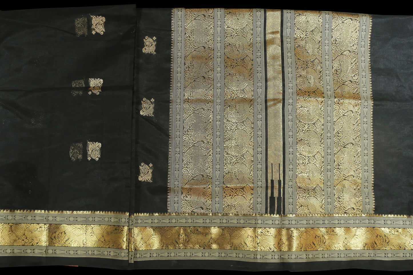 Black with gold zari