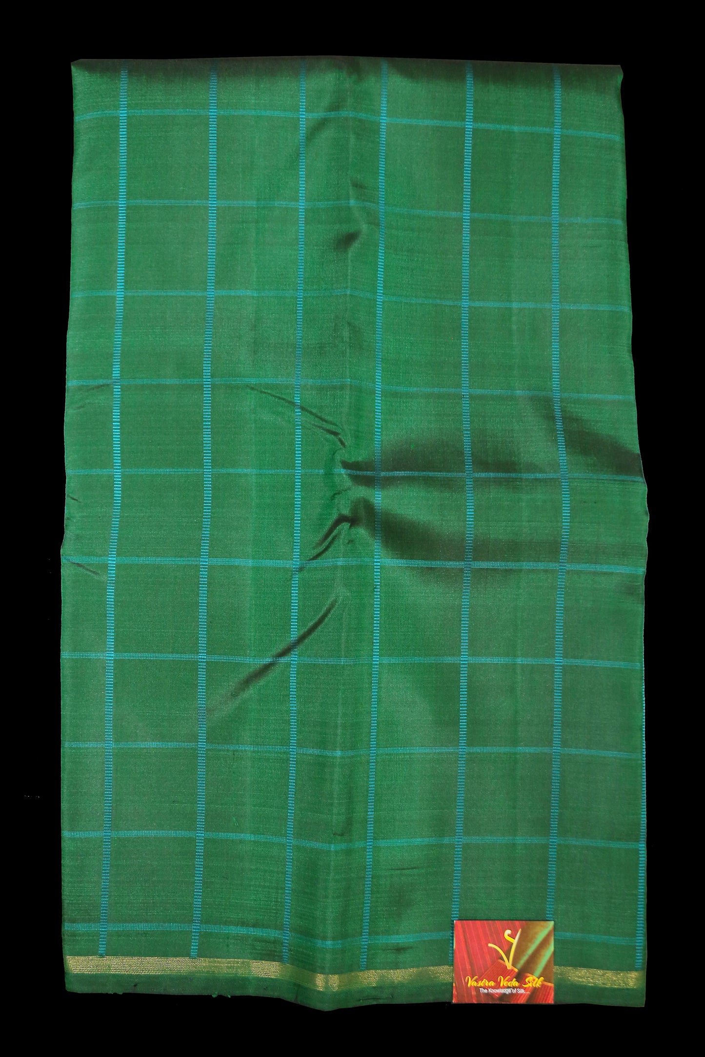 Emerald green with black saree