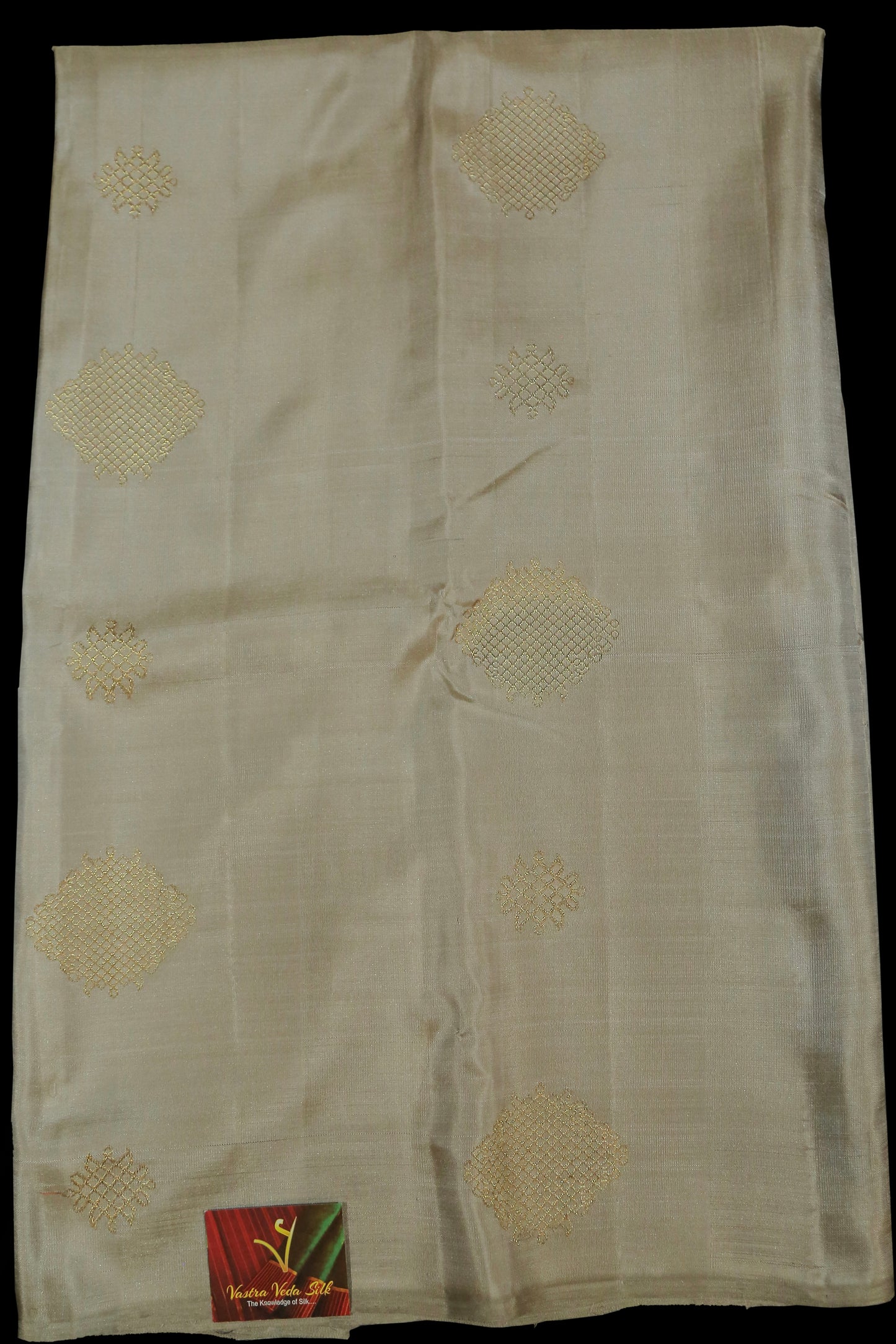 Beije and blue kolam saree