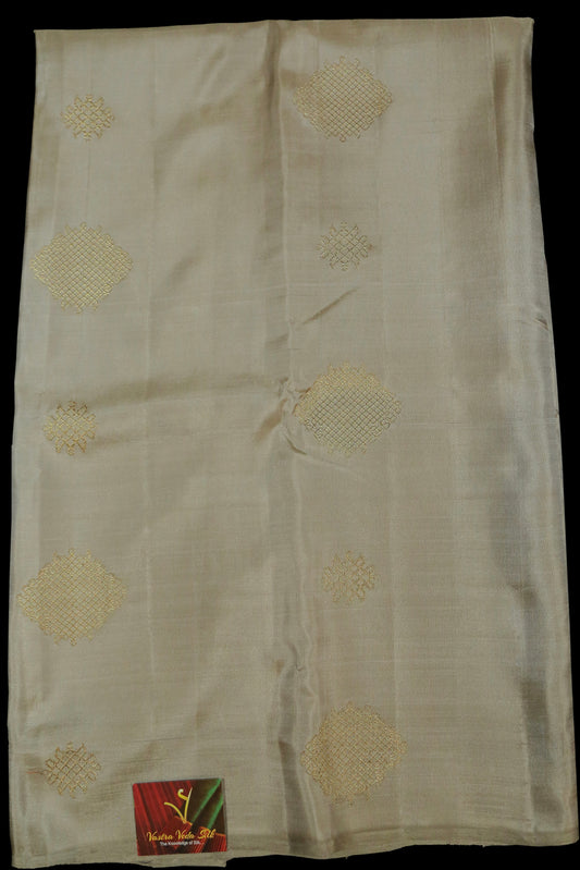 Beije and blue kolam saree