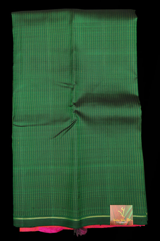 Emerald green with pink saree