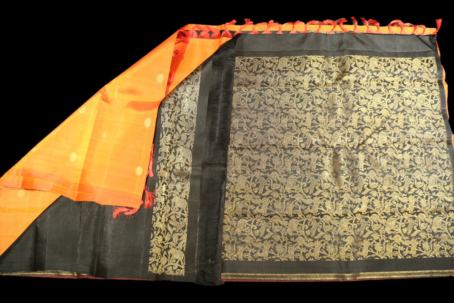 Fanta orange with black saree