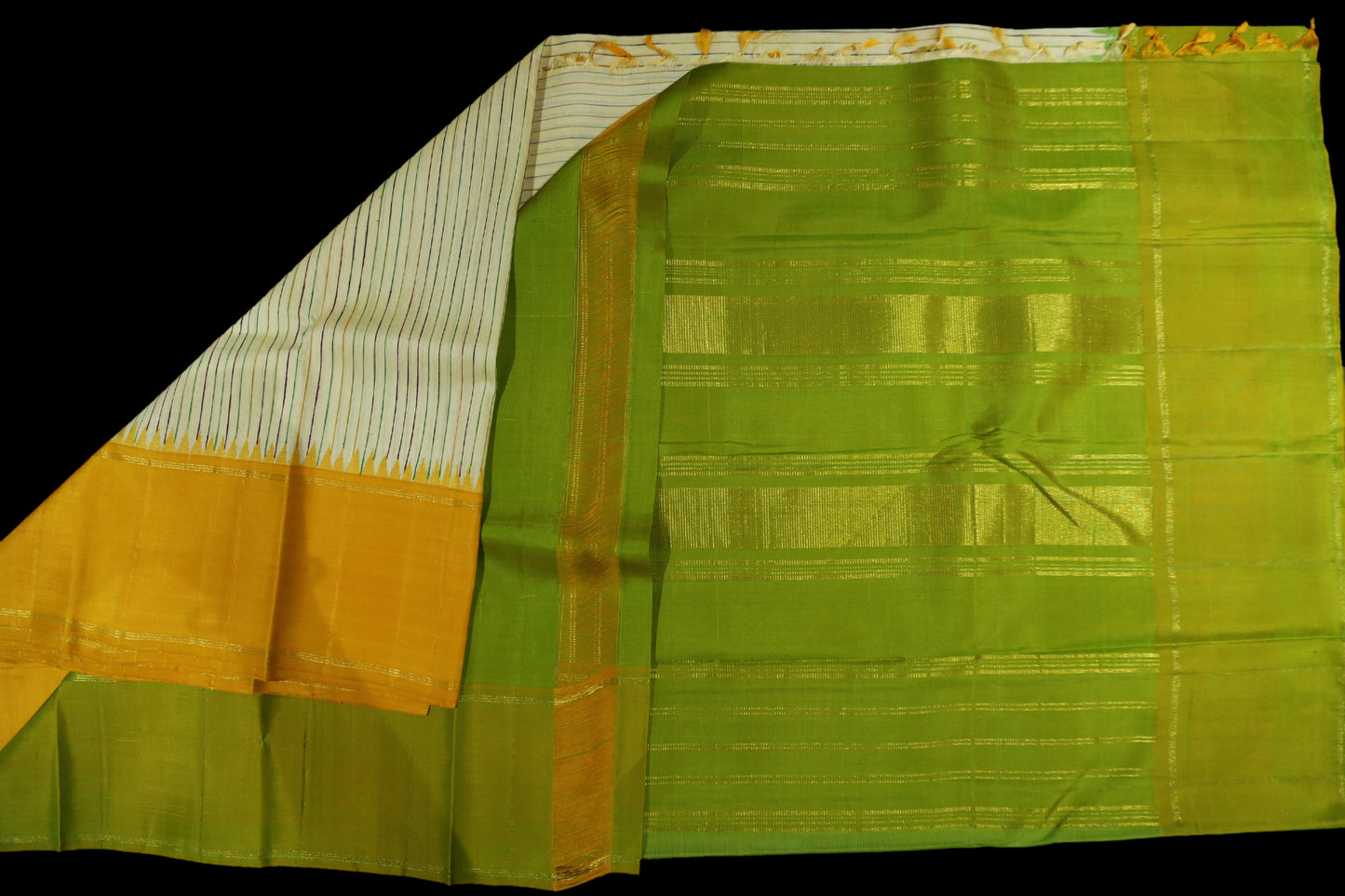 Cream with green and yellow saree