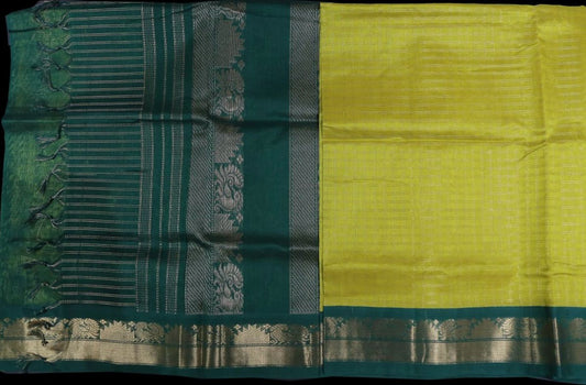 Yellow with emerald green saree