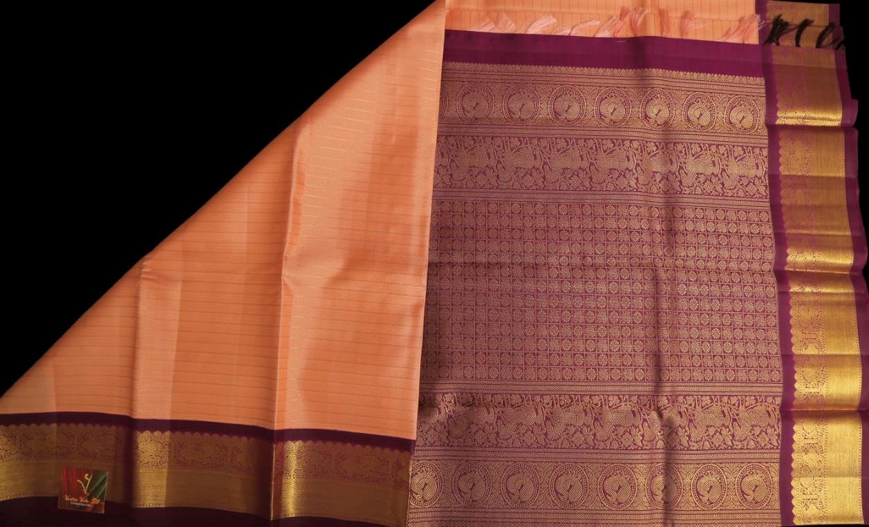 Peach with wine shade saree