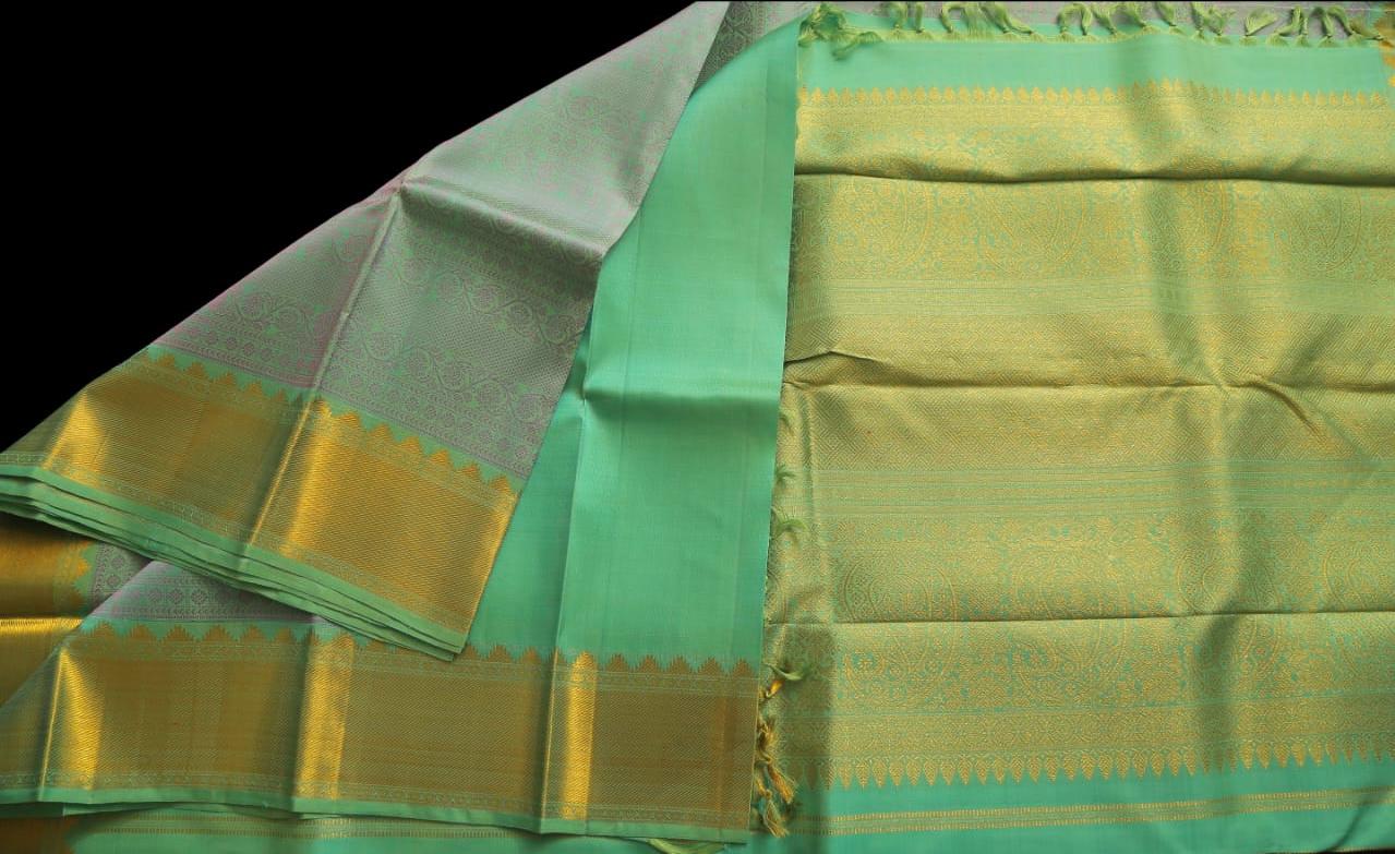 Teal green with lavender saree